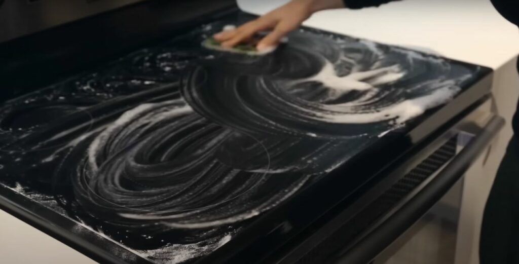 cooktop cleaning with baking soda for grime removal